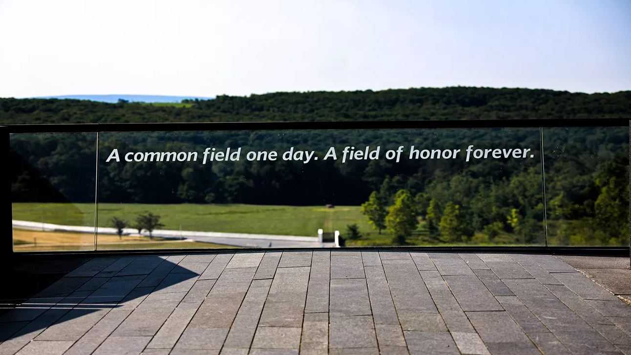 Photograph of Flight 93 National Memorial in Pennsylvania honoring the 40 crew and passengers who fought back against hijackers on September 11, 2001. The Flight Path Overlook allows visitors to look down at the Wall of Names and crash site. [NPS.gov]